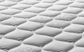 a close up of a mattress that has been made