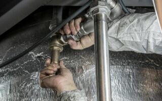 Plumber Installs Pipe Fittings