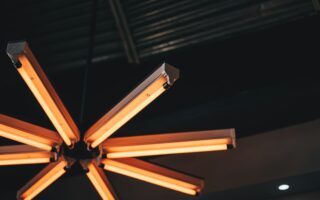 a wooden chair with a light