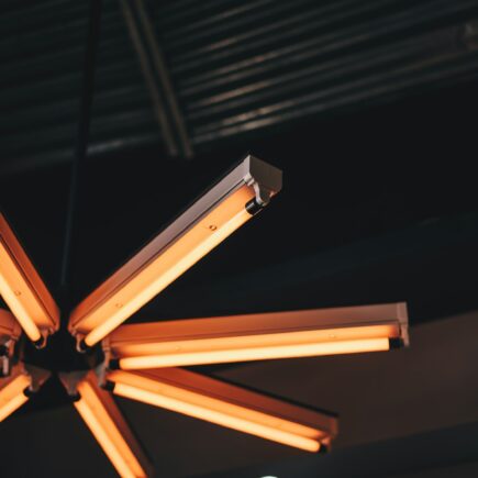 a wooden chair with a light