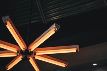 a wooden chair with a light