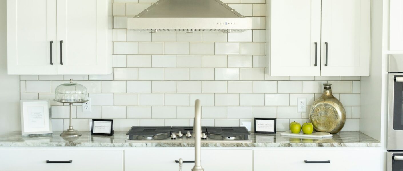 white and silver kitchen sink