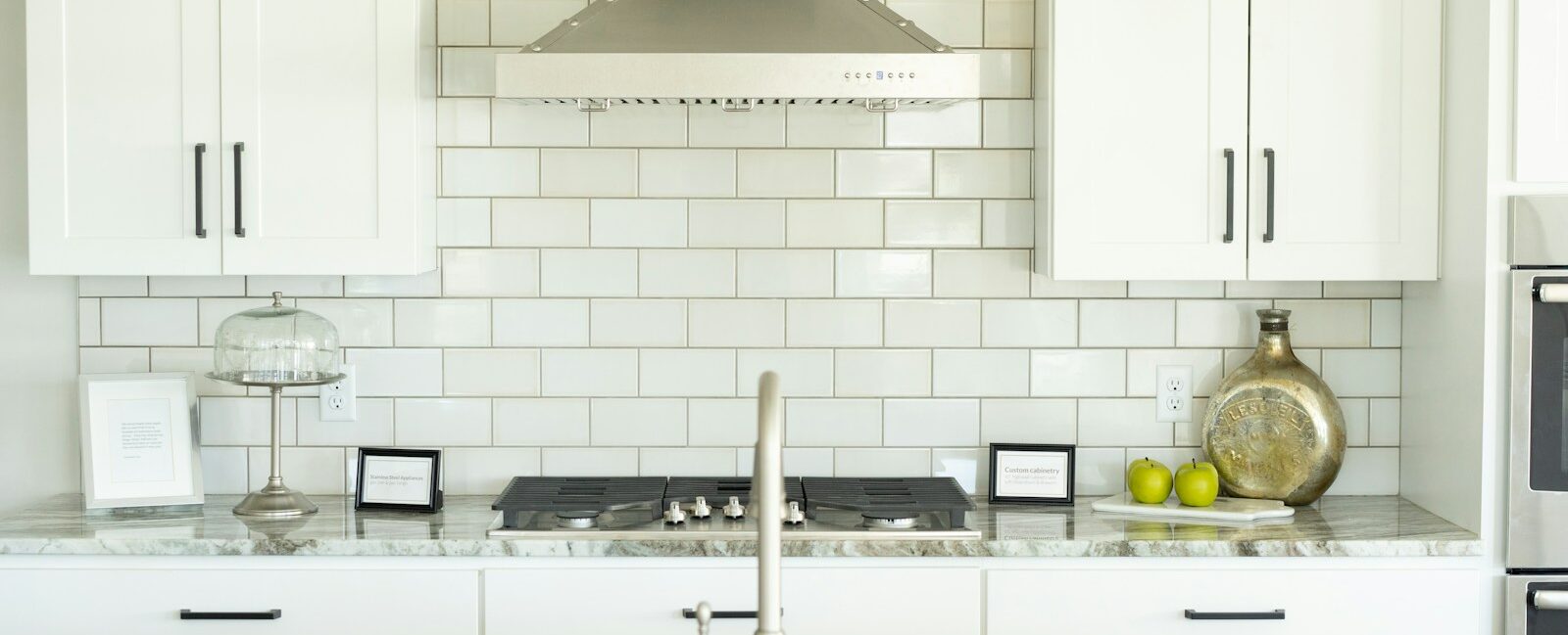 white and silver kitchen sink